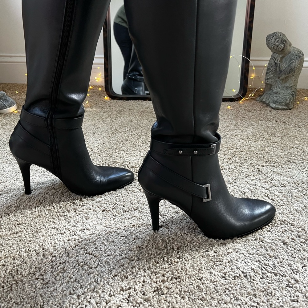 Levity  Leather black high heel boots.